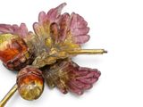 leaves and acorns on a white surface with a white background
