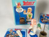 a box of toys and a toy figurine sitting on a table