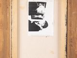 an old picture of a man and a woman sitting in front of a piano