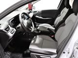 the interior of a car with a steering wheel and a dashboard
