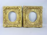 pair of antique gold picture frames with ornate design