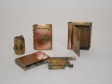four different types of lighters sitting on a table