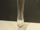 a glass vase that is sitting on a table