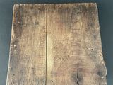 a close up of a piece of wood on a table