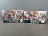 two disney figurines of lora and lora