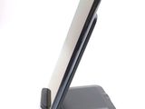 a cell phone that is sitting on top of a stand