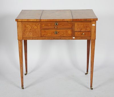 a small wooden table with drawers on it