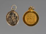 two gold and silver medallions with a picture of a man and woman on them