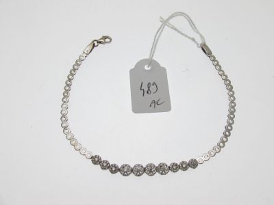 a close up of a bracelet with a price tag on it