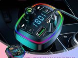 an image of a car charger with a digital display in the center