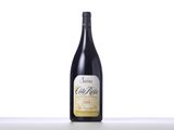 a bottle of wine sitting on top of a table