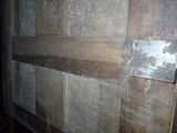 a picture of a wooden paneled wall in a room