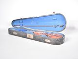 a blue case with a fish in it on a white surface