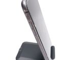 a close up of a cell phone on a stand