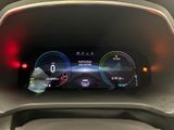 the dashboard of a car with a digital display on it