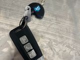 a car key that is laying on a table