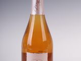 a bottle of wine that is sitting on a table