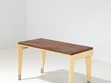 an image of a wooden bench with metal legs in a white room