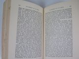 a open book that is sitting on a table