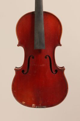 a close up of a violin with a bow on a white background
