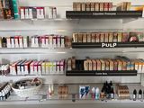 many different types of cigarettes on the shelves in the store