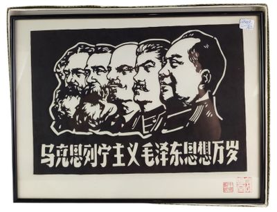 a black and white picture of a group of men with a sign