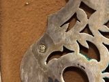 a close up of a metal object on a table