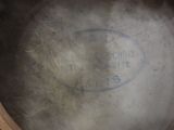 a close up of a frying pan with a label on it