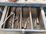 a lot of tools that are sitting in a drawer
