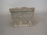an old metal box that is sitting on a table