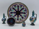a group of vases that are sitting on a table