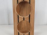 wooden wine rack with three wine glasses on it