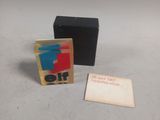 a small black box with a red and blue logo on it