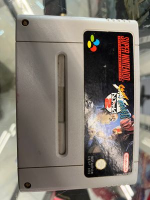 un vieux jeu Nintendo exposé dans une vitrine