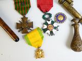 many medals and other items that are on the table