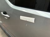 a sticker on the door of a car that says studio