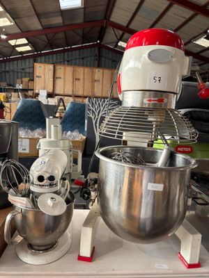 a lot of mixers that are sitting on a table