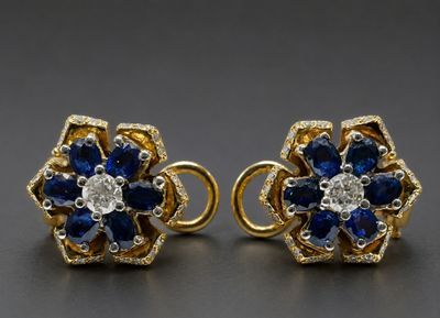 a pair of sapphire and diamond earrings