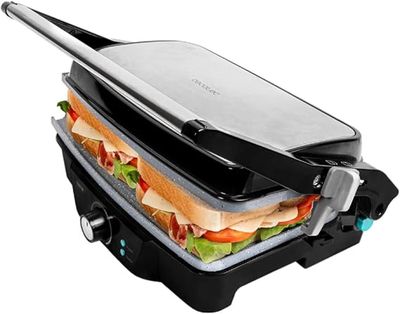 a close up of a sandwich maker with a sandwich in it