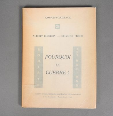 an old book with a picture of a clock on top of it