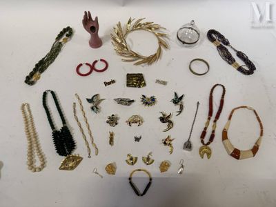 many different types of jewelry on the table