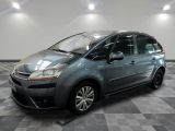 the grey citrole is parked in the garage on a checkered floor