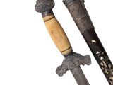 pair of antique chinese swords with wooden handles and carved handles