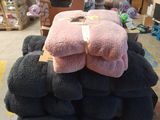a pile of towels that are stacked on top of each other