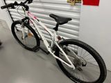 a bike that is parked in front of a garage door
