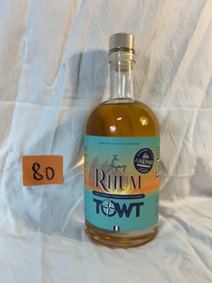 a bottle of rum that is sitting on a table