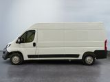 a white van that is parked in a parking lot
