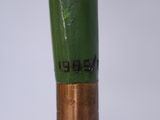 a close up view of a bamboo stick with writing on it