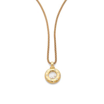 a gold plated necklace with a white pearl and a gold chain