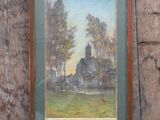 une photo d'un tableau accroché à un mur en bois